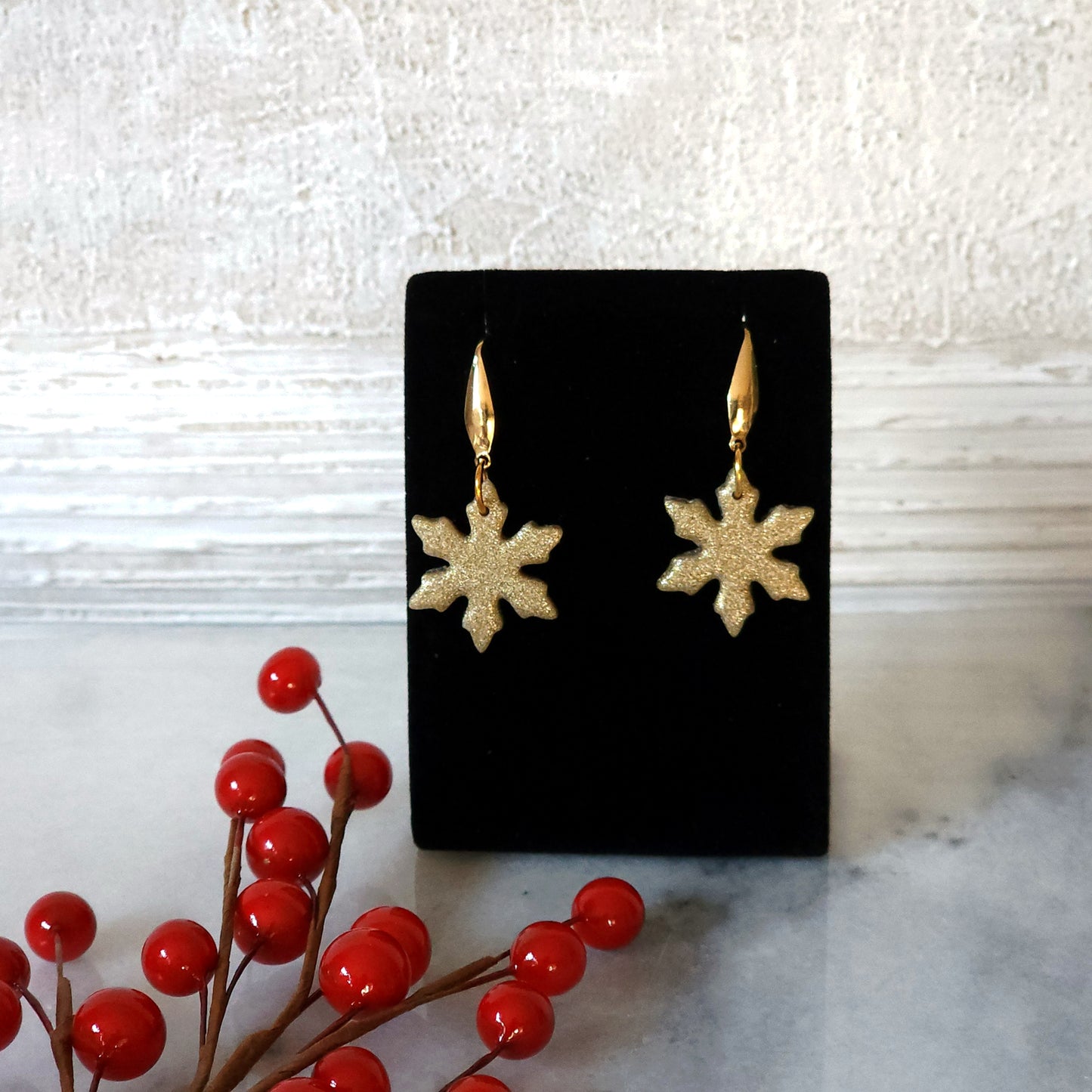 Gold Snowflake Dangle Earrings